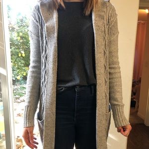 Small, long gray sweater
